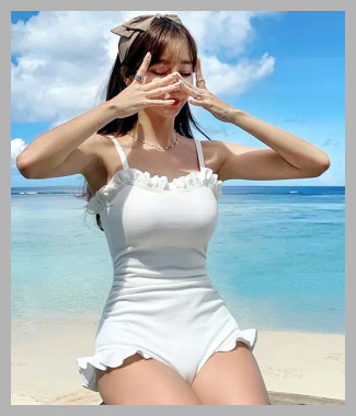 Komorkowe - Spaghetti-Strap Ruffle Trim Swimsuit<br><span style='text-align: center;'>$17.4 yesstyle.com</span>